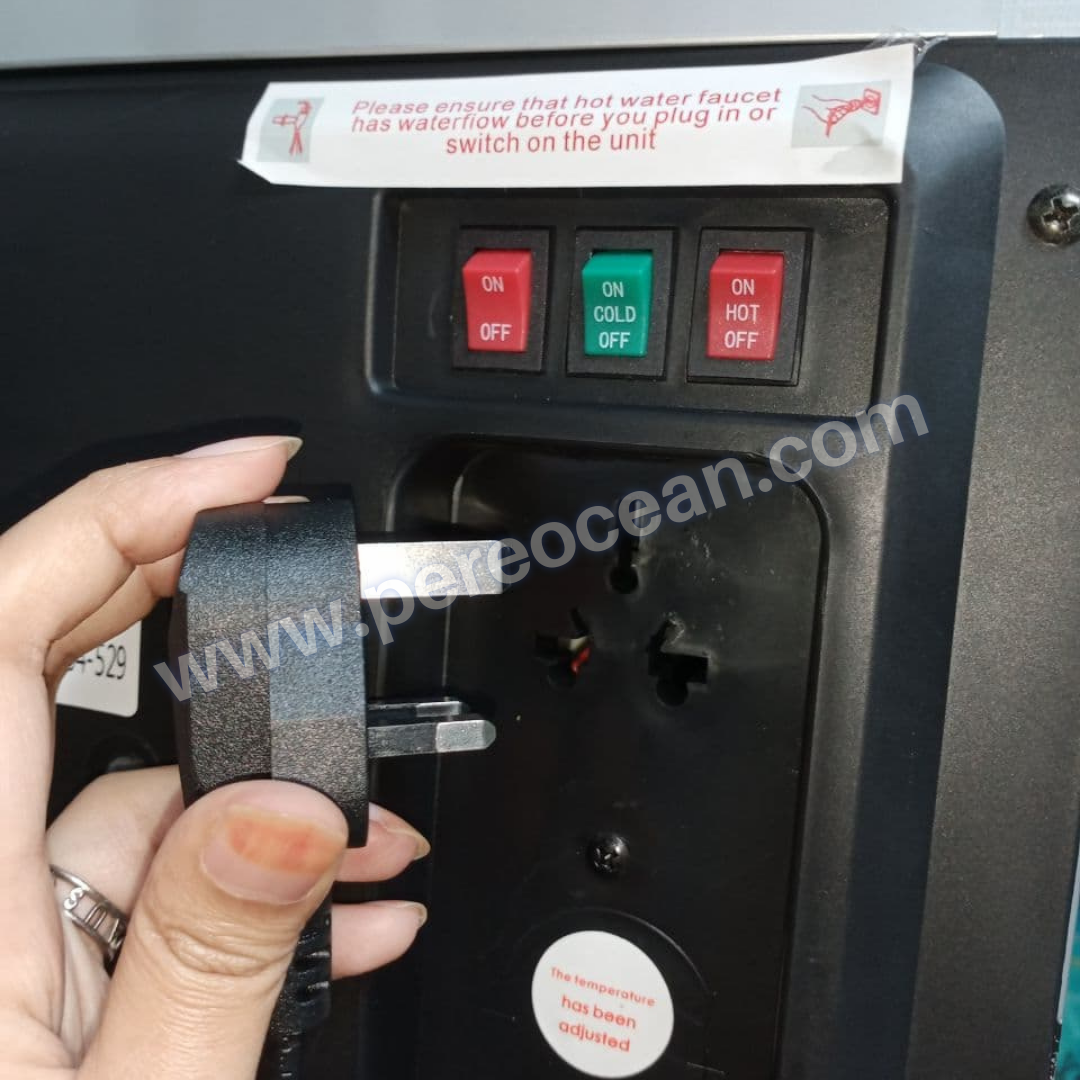 Hot Water Switch, Cold Water Switch, Water Suction Pump Switch and Plug Holder of Pere Ocean Black Diamond Hot and Cold Bottom Load Floor Standing Bottled Water Dispenser Singapore